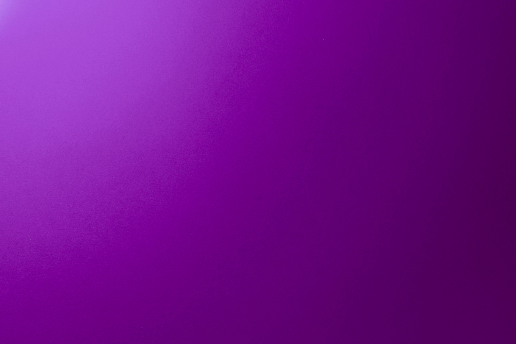 Gradient violet colored paper background.